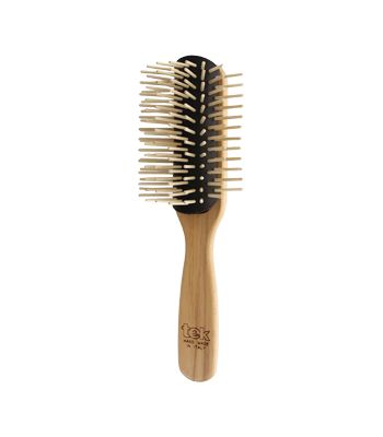 Big disassembled brush with long wooden pins