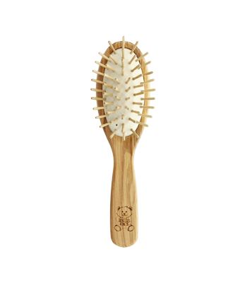 Baby’s brush with wooden pins